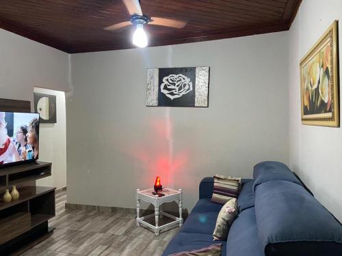 Et tv og/eller underholdning på Mara e Jorge Suites Beira Mar