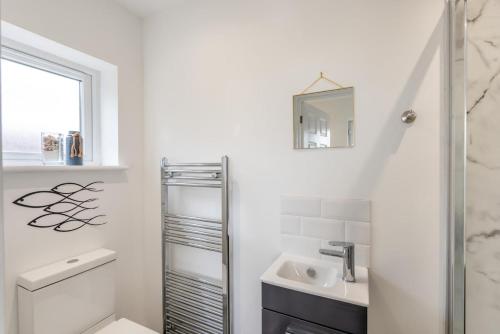 Et badeværelse på 3 Bed in Georgeham oc-seashe