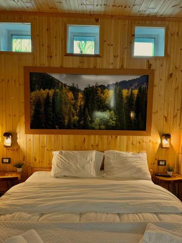 Llit o llits en una habitació de Dardha INN