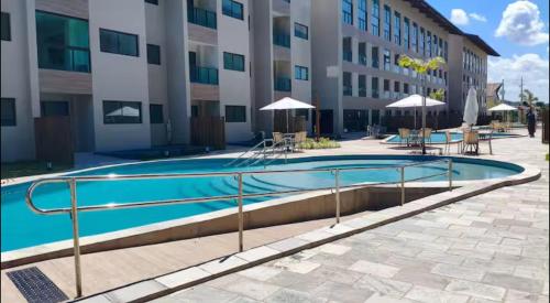 Der Swimmingpool an oder in der Nähe von Apartamento na Praia dos Carneiros a 250m do mar