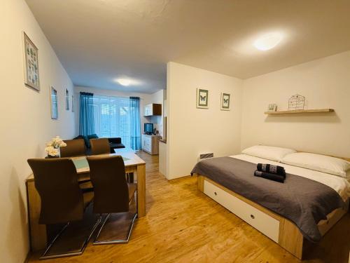 En eller flere senge i et værelse på Lipno 4