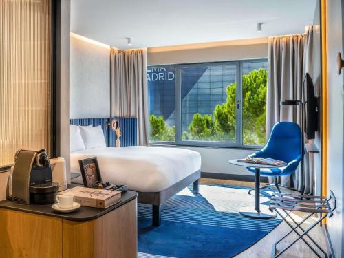 Postel nebo postele na pokoji v ubytování Novotel Campo De Las Naciones