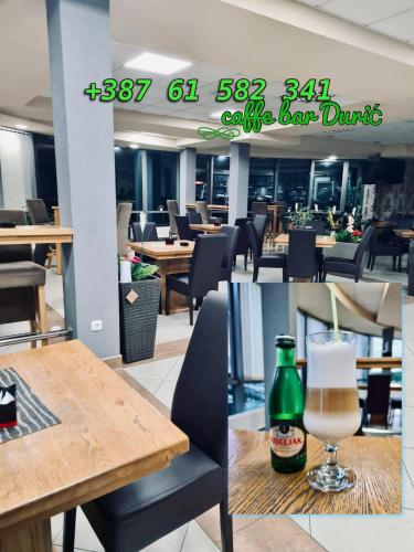 a restaurant with a table and a bottle of beer at Durić doo in Cazin