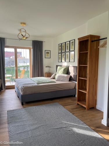 Fotografie z fotogalerie ubytování Altstadtflair Modernes Studio mit Gartenblick v destinaci Neuruppin