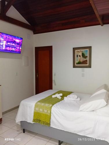 Postel nebo postele na pokoji v ubytování Apartamento com Quintal - Ar Cond - Ótima Localização