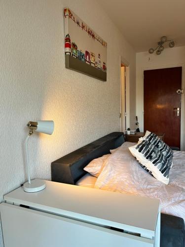 Postel nebo postele na pokoji v ubytování Le 26 Deauville