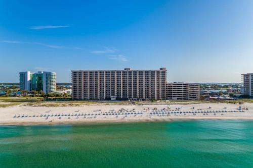 a view of a beach with a large building at Phoenix X 504 in Orange Beach
