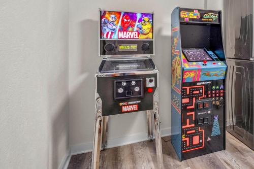a video game system next to a video game machine at Luxury Villa Heated Pool, Putt-Putt & Bocce in Bradenton