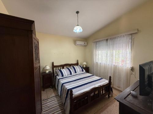 Postel nebo postele na pokoji v ubytování CASA en COSTA AZUL