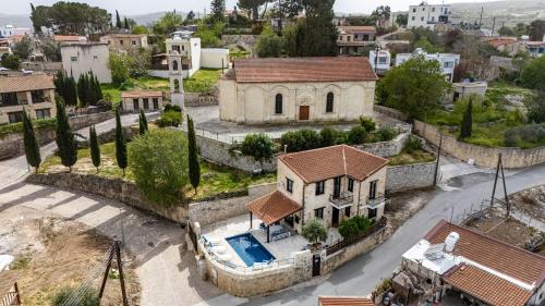 an aerial view of a house with a swimming pool at Stroumpi Private Pool Villa in Stroumbi