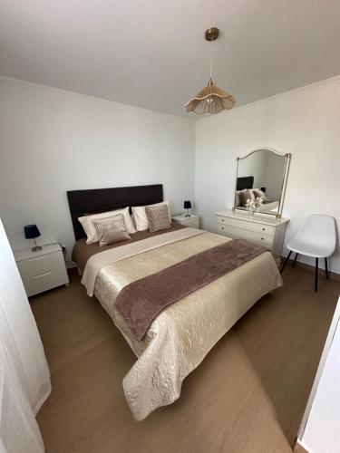 Postel nebo postele na pokoji v ubytování Little Blue Paradise