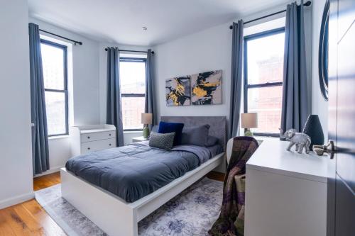 En eller flere senge i et værelse på Central Park Residence in New York