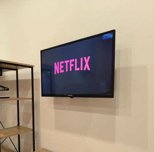 Télévision ou salle de divertissement dans l'établissement Casa con vista