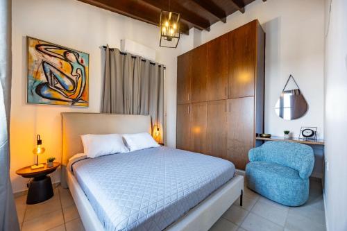 En eller flere senge i et værelse på Stroumpi Private Pool Villa