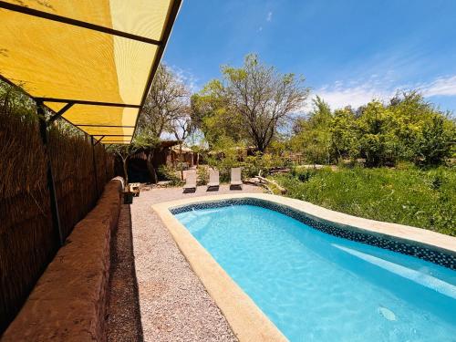 Swimmingpoolen hos eller tæt på Cabañas Turi Lackar