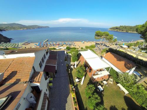 an aerial view of a beach and buildings at Frank's Hotel in Capoliveri