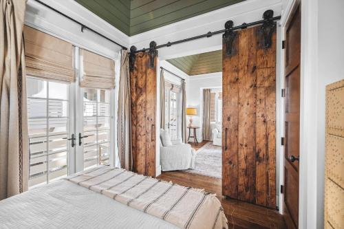 En eller flere senge i et værelse på Sadie's Cottage