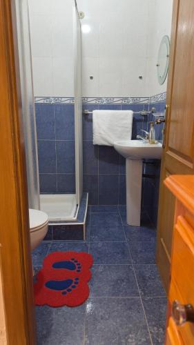 a bathroom with a toilet and a sink at شقة الفن Art Apartment in Marrakesh