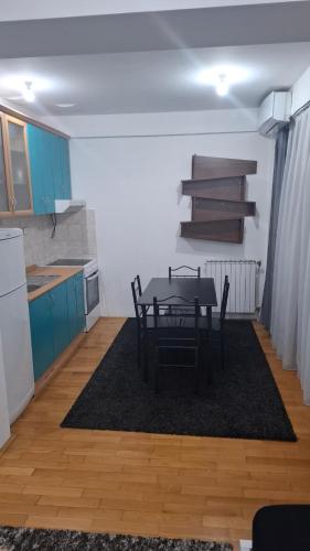 Køkken eller tekøkken på Romansa Apartment