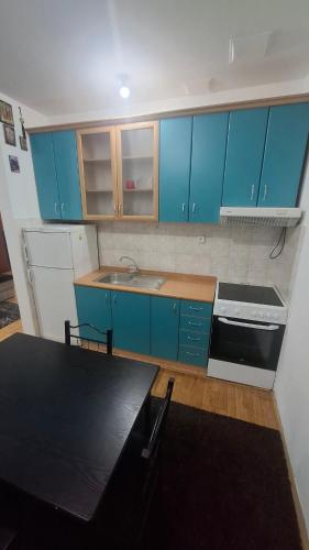 Kuchyň nebo kuchyňský kout v ubytování Romansa Apartment