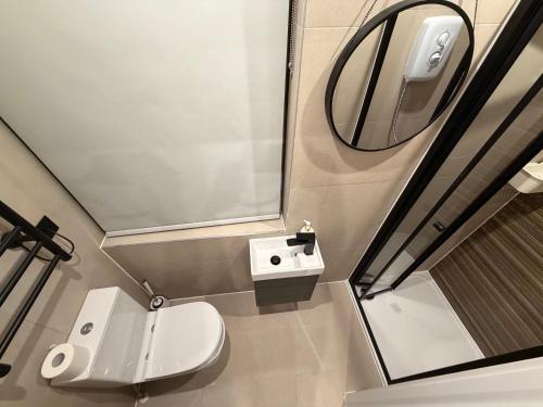 Et badeværelse på Stylish Studios 20 min train to Central London