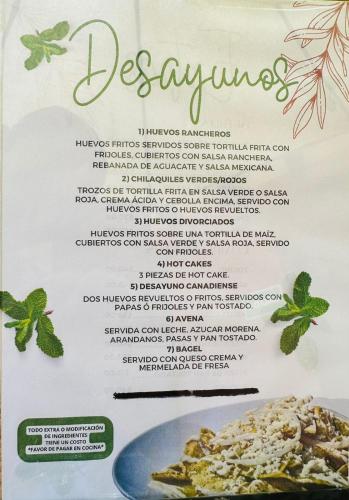 a menu for a restaurant with a plate of food at Casa de Leyendas in Mazatlán