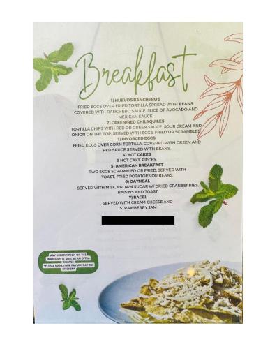 a menu for breakfast with a plate of food at Casa de Leyendas in Mazatlán