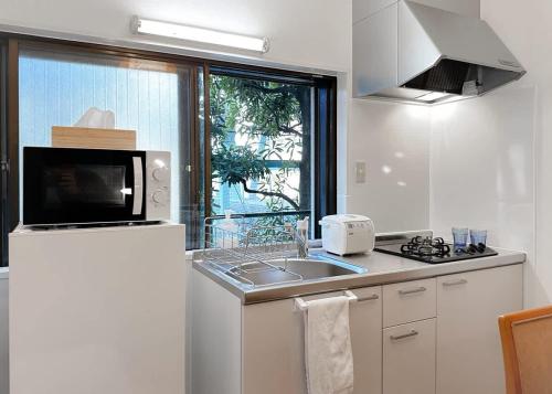 The Bonsai Otsuka 202, Fresh Parkside Private Apartment in Central Tokyo
