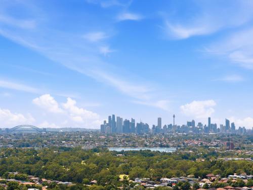 a view of a city with a city skyline at The Sky Perch in Sydney