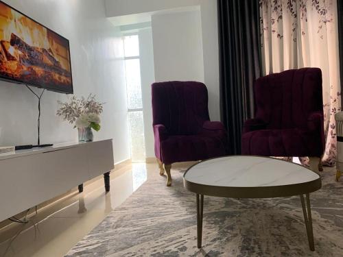 Een TV en/of entertainmentcenter bij Grey Nest Grey point 303
