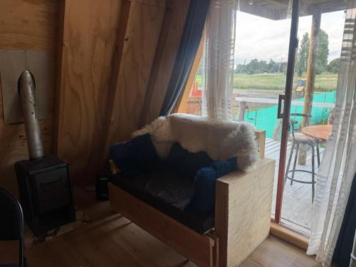 Swimmingpoolen hos eller tæt på Cabaña Pinos Magicos