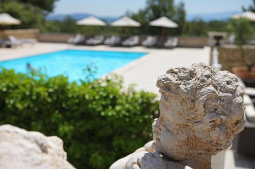 Piscina en o cerca de Le Phébus & Spa – Relais & Châteaux