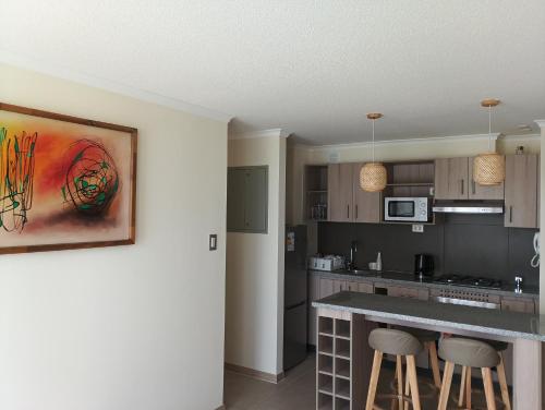 Kuchyň nebo kuchyňský kout v ubytování Vacaciones Playa y Faro La Serena