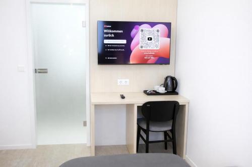 TV/Unterhaltungsangebot in der Unterkunft Niko Hotel am Hannover Hbf