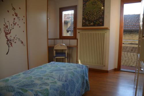 A bed or beds in a room at Casa Gibiseo