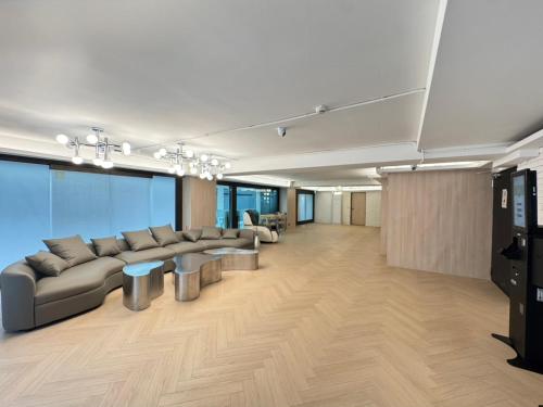 TV a/nebo společenská místnost v ubytování 浮逸旅館 - 台中車站館 - 近宮原眼科和LaLaport