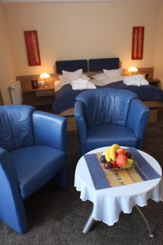 Ένα ή περισσότερα κρεβάτια σε δωμάτιο στο Hotel Lenauhof