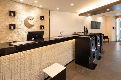 TV a/nebo společenská místnost v ubytování Comfort Hotel Wakayama