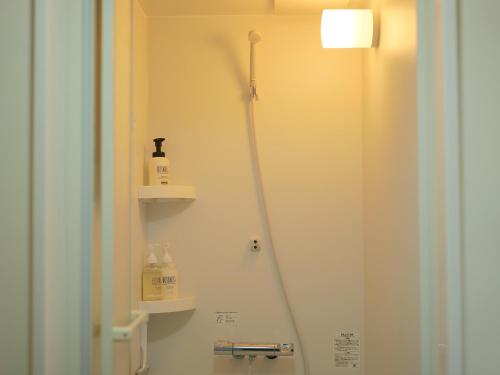 Koupelna v ubytování ゲストハウス真鶴の家-Guest House Manazuru House