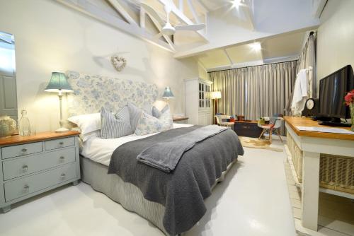 Ein Bett oder Betten in einem Zimmer der Unterkunft The Oyster Shack by The Oyster Collection