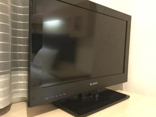 a flat screen tv sitting on top of a table at Green Rich Hotel Yamaguchi Yuda Onsen in Yamaguchi