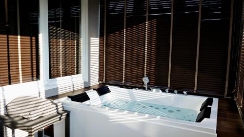 Billede fra billedgalleriet på Gîte familial 6 pers balnéo proche Pairi Daiza i Brugelette