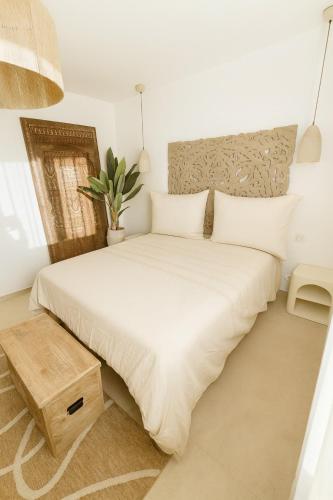 Llit o llits en una habitació de Casa Athéna