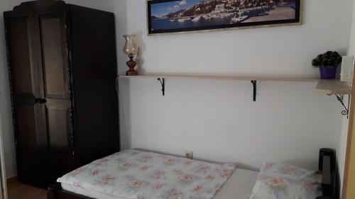 Ένα ή περισσότερα κρεβάτια σε δωμάτιο στο Spasic Apartment
