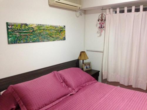 Ένα ή περισσότερα κρεβάτια σε δωμάτιο στο Departamento en Nueva Cordoba