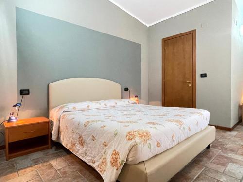 En eller flere senge i et værelse på Agriturismo Taglio del Re