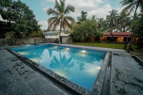 Hồ bơi trong/gần Kashid Heritage Beach Resort