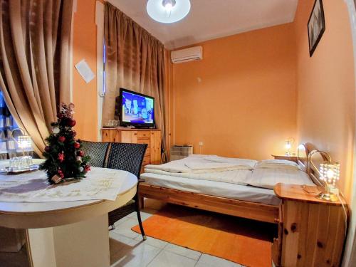 Postel nebo postele na pokoji v ubytování Glória apartman