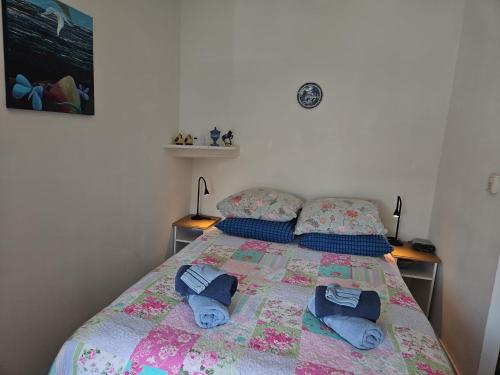 Postel nebo postele na pokoji v ubytování BnB Sharon's and Ser's place in Heer-Maastricht