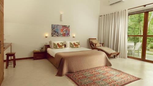 Giường trong phòng chung tại Glasshouse Victoria